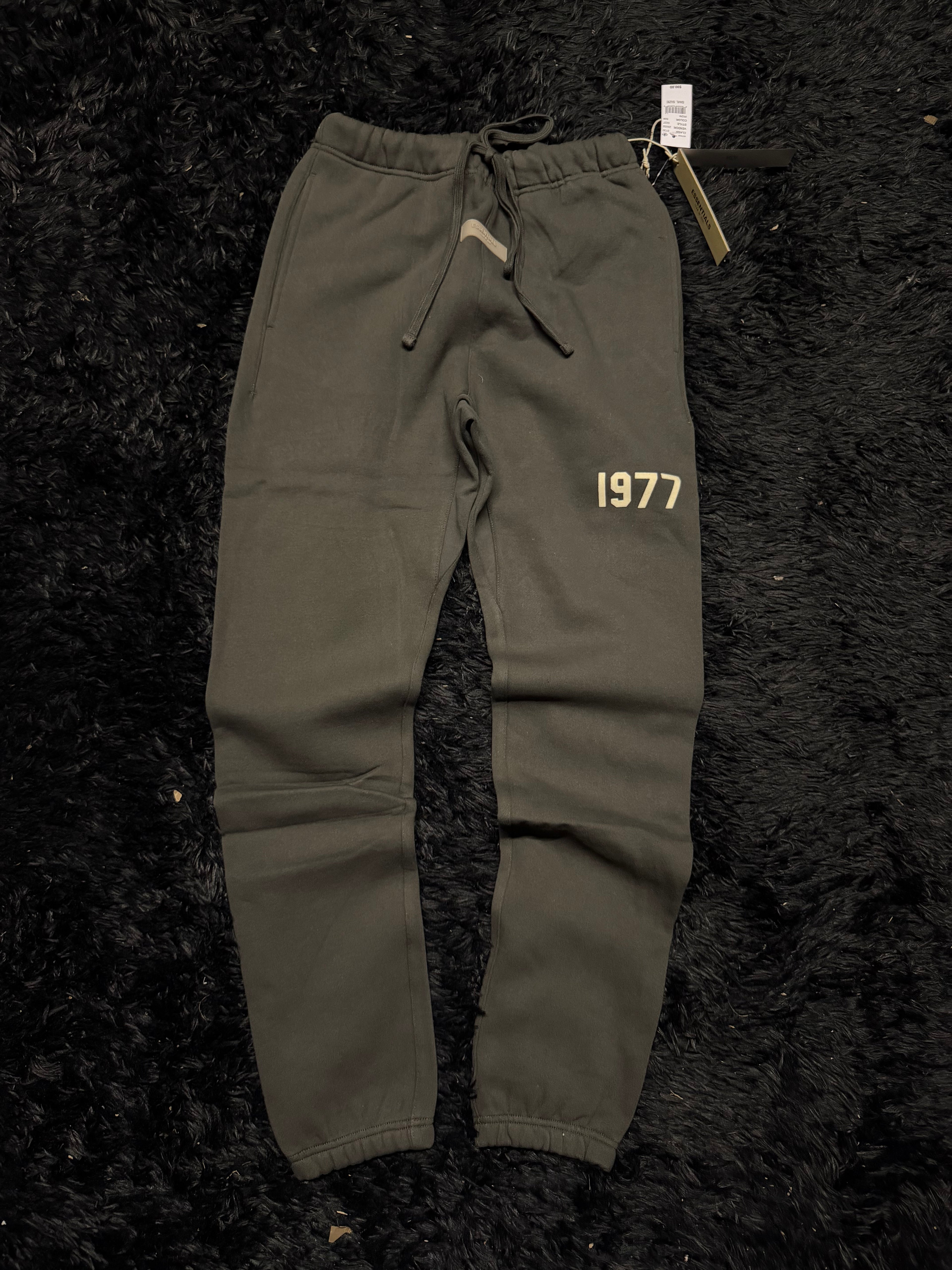 Fear of God Essentials Sweatpants – Black “1977” Logo Joggers