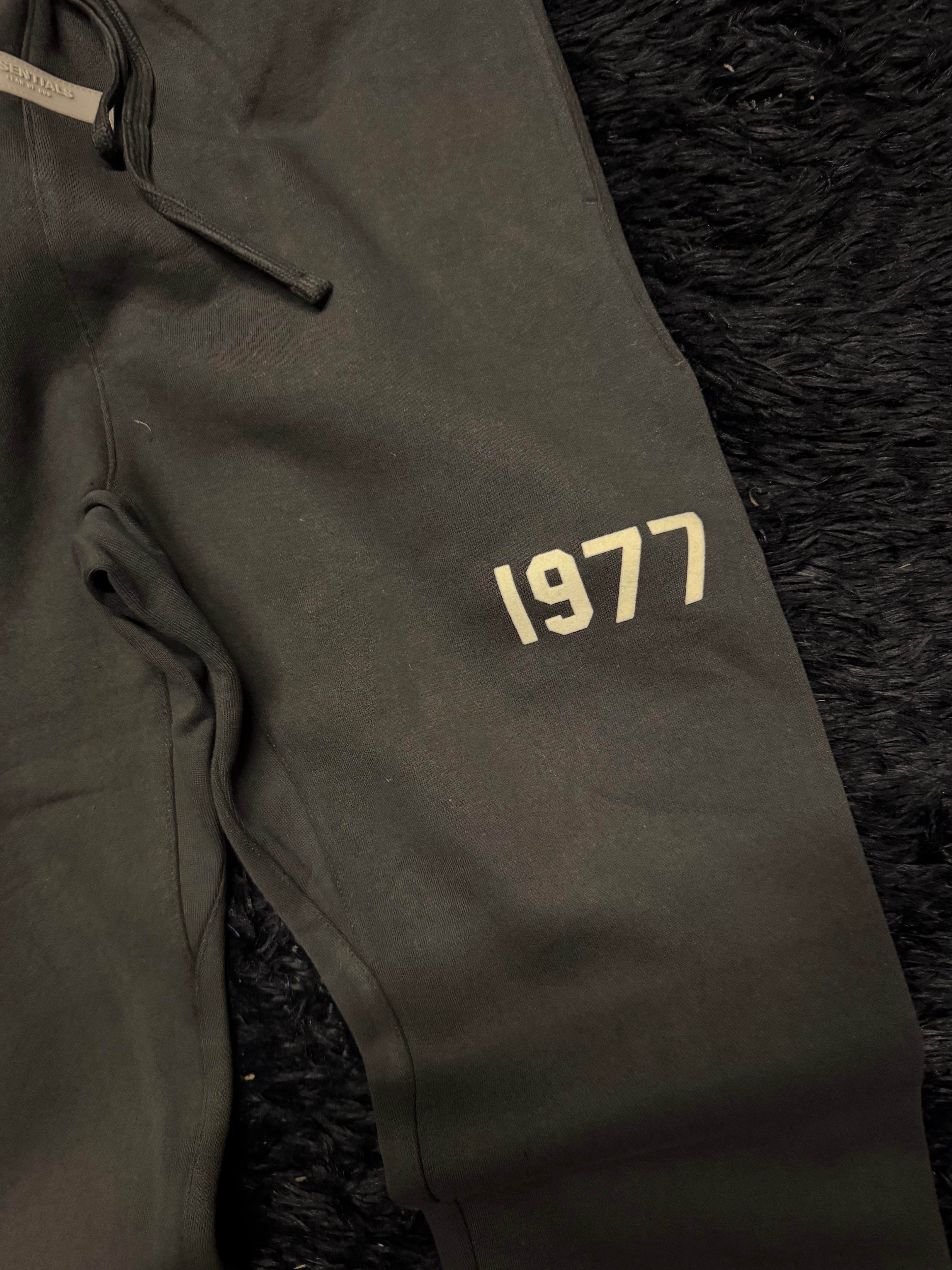 Fear of God Essentials Sweatpants – Black “1977” Logo Joggers