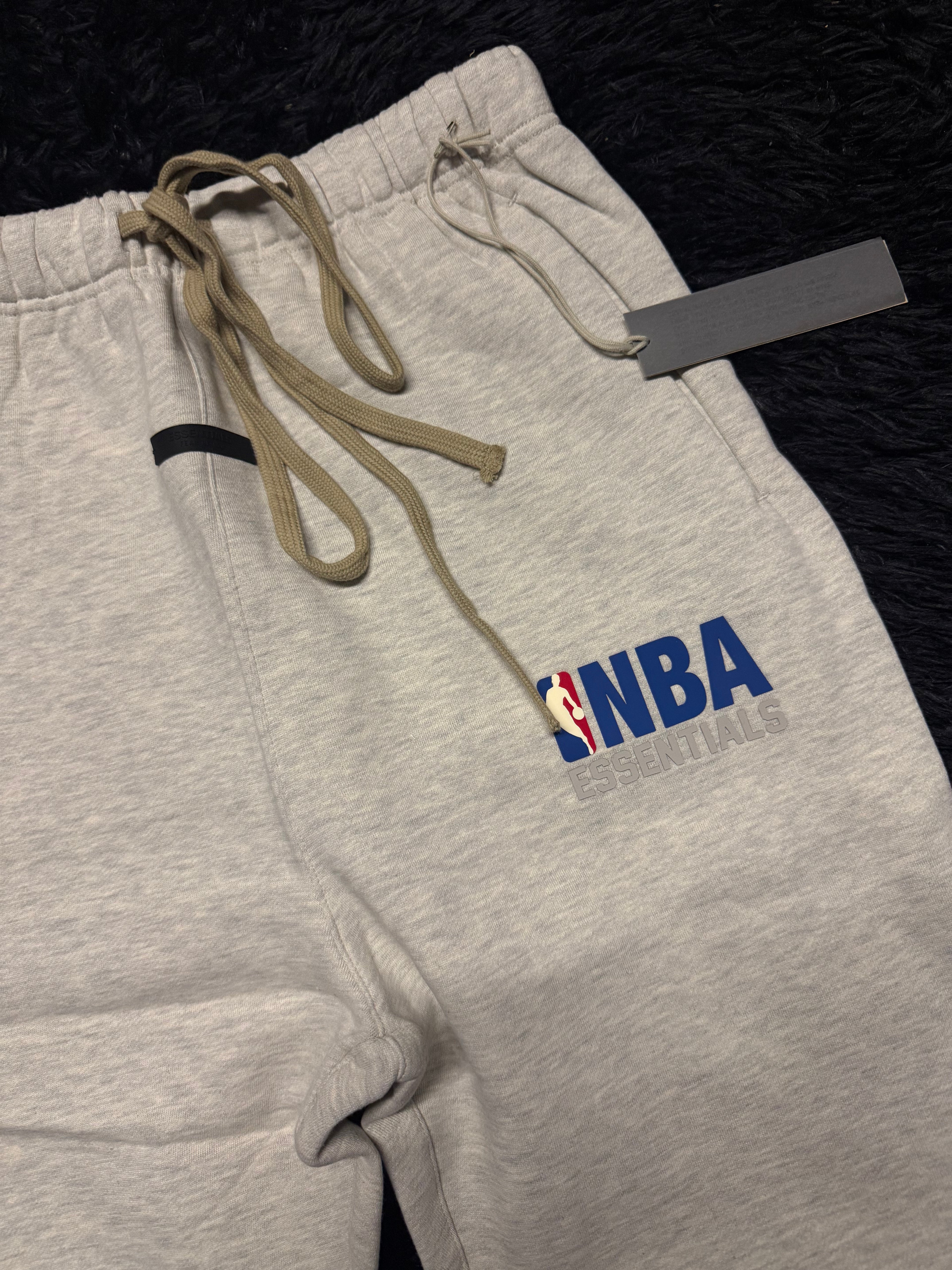 Fear of God Essentials x NBA Sweatpants – Black & Grey Logo Joggers