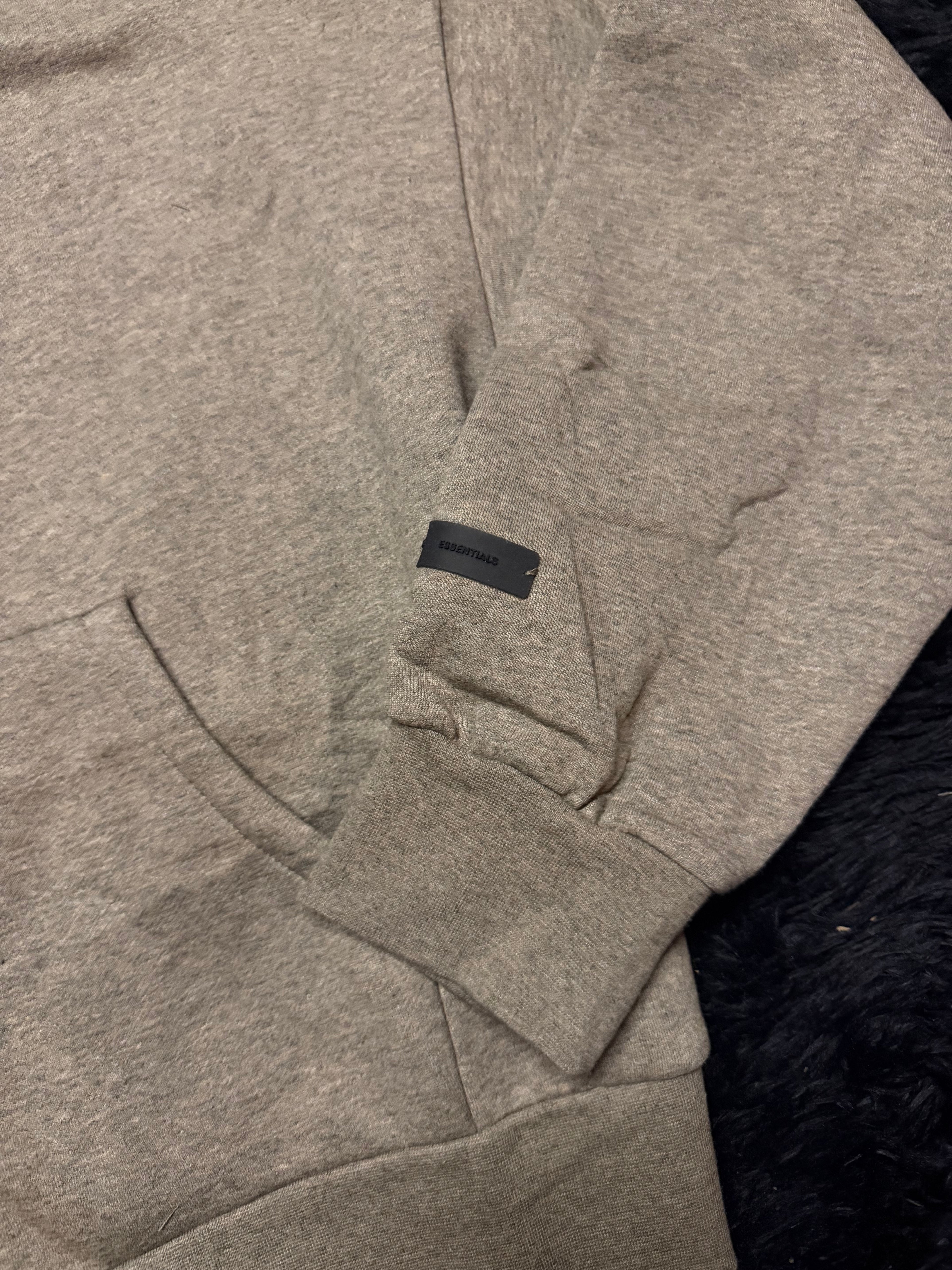 Fear of God Essentials Zip-Up Hoodie – Grey “ESSENTIALS Fear of God” Metallic Logo